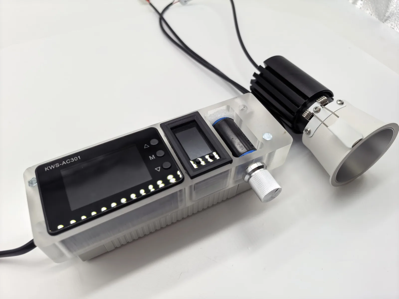 Recessed LED spotlight connected to adjustable testing driver