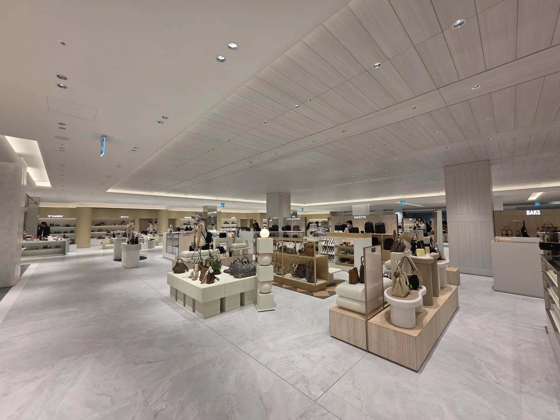 Lotte Shopping Mall with uniform ambient downlighting by INTERO and SLIM
