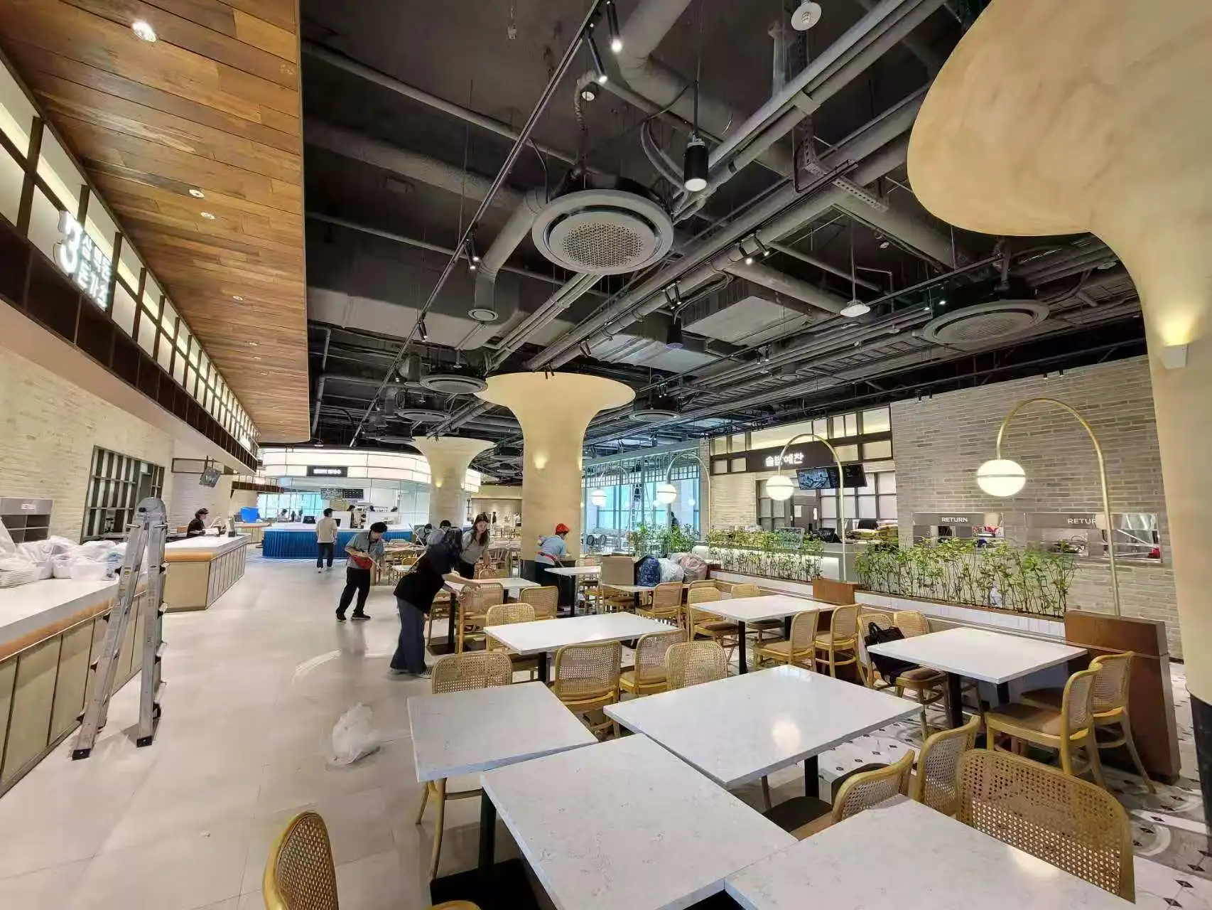 Tasty Ground Busan dining area with focused task lighting from LANKY and SOFT luminaires