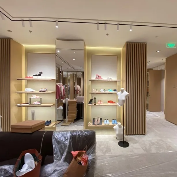Track lights installed in the Loro Piana retail store, providing premium accent lighting for the luxury fashion storefront.