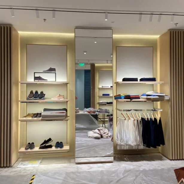 Track lights installed in the Loro Piana retail interior, providing architectural lighting for luxury fashion displays.