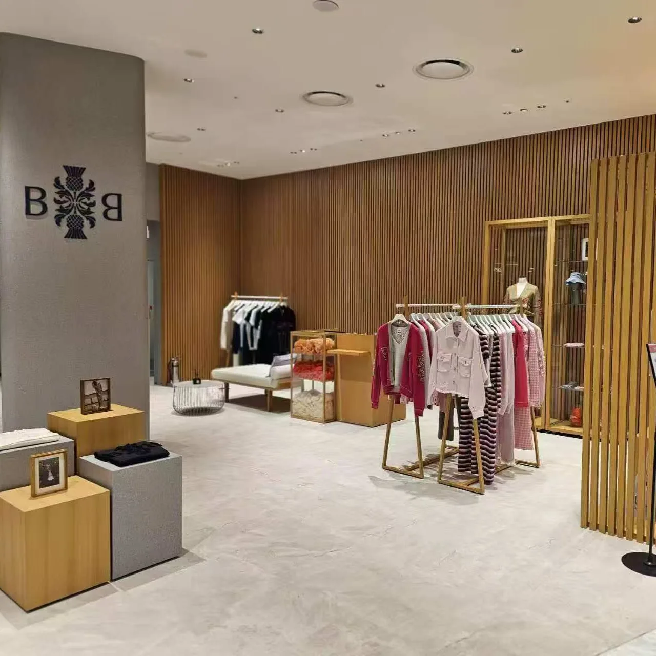 Artdon FLEXI Recessed Downlights and SLIM Downlights installed in a fashion clothing store in Thailand, providing balanced architectural lighting for the retail space.