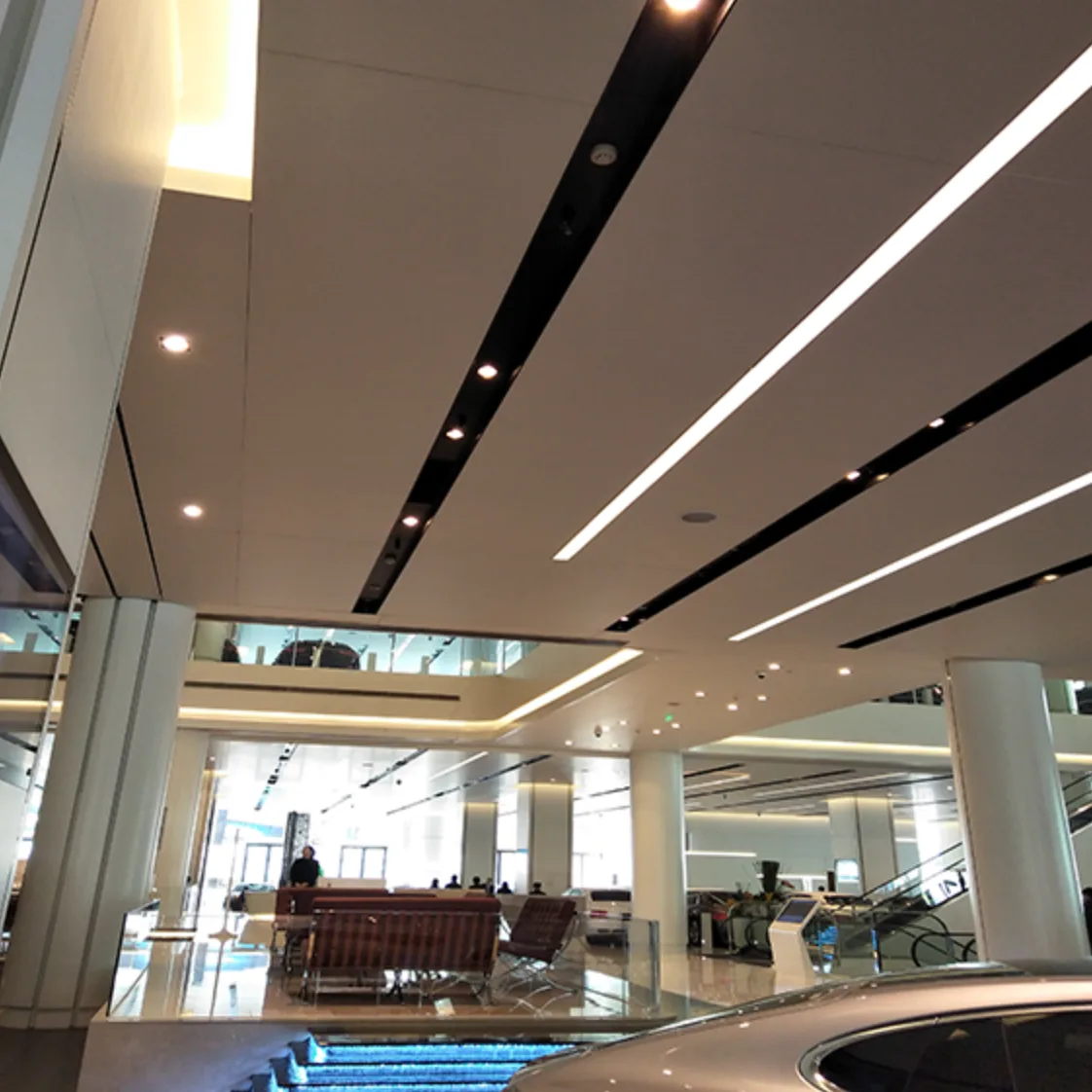 HICORE recessed downlights installed in a modern hotel lobby, providing elegant architectural lighting for hospitality reception areas.