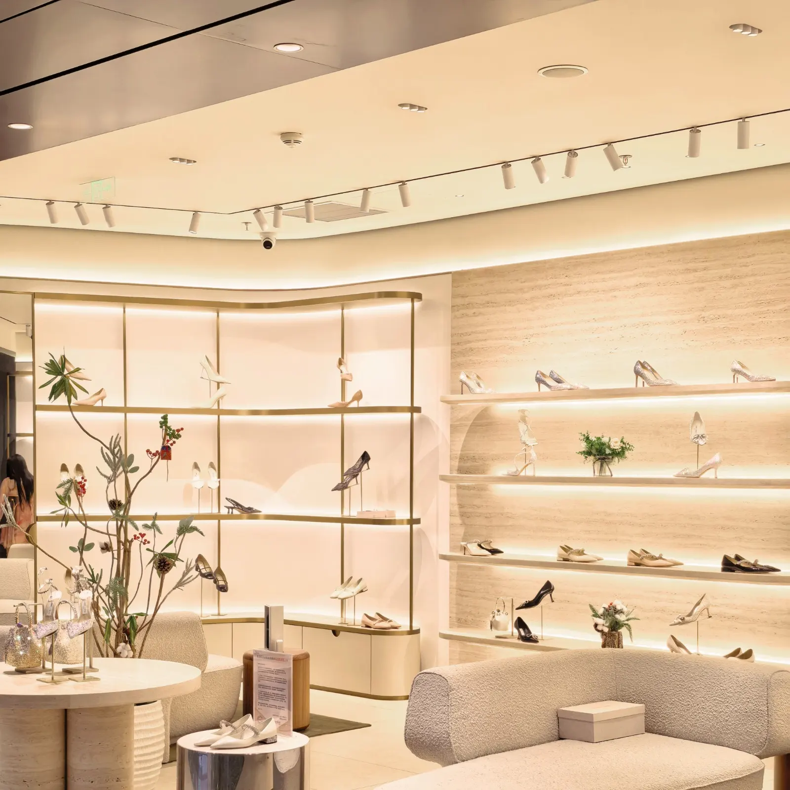 ORBI recessed downlights installed in a luxury fashion boutique, providing refined architectural lighting for premium retail displays.