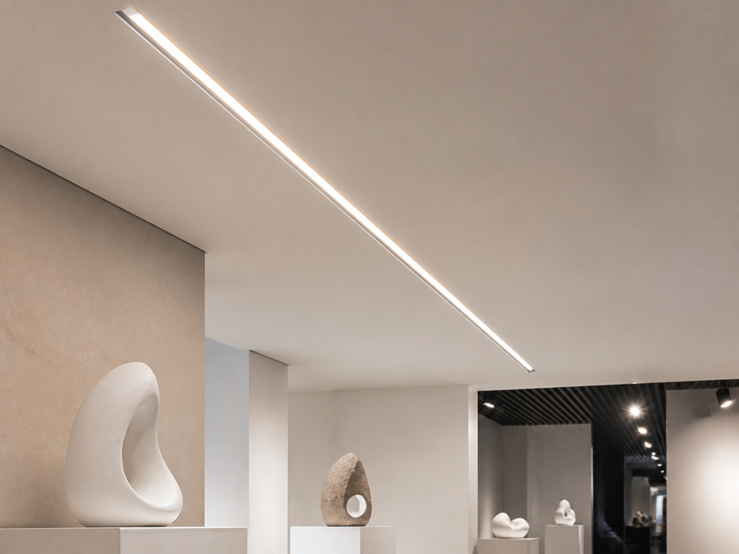 Discreet recessed linear lighting for gallery and display environments