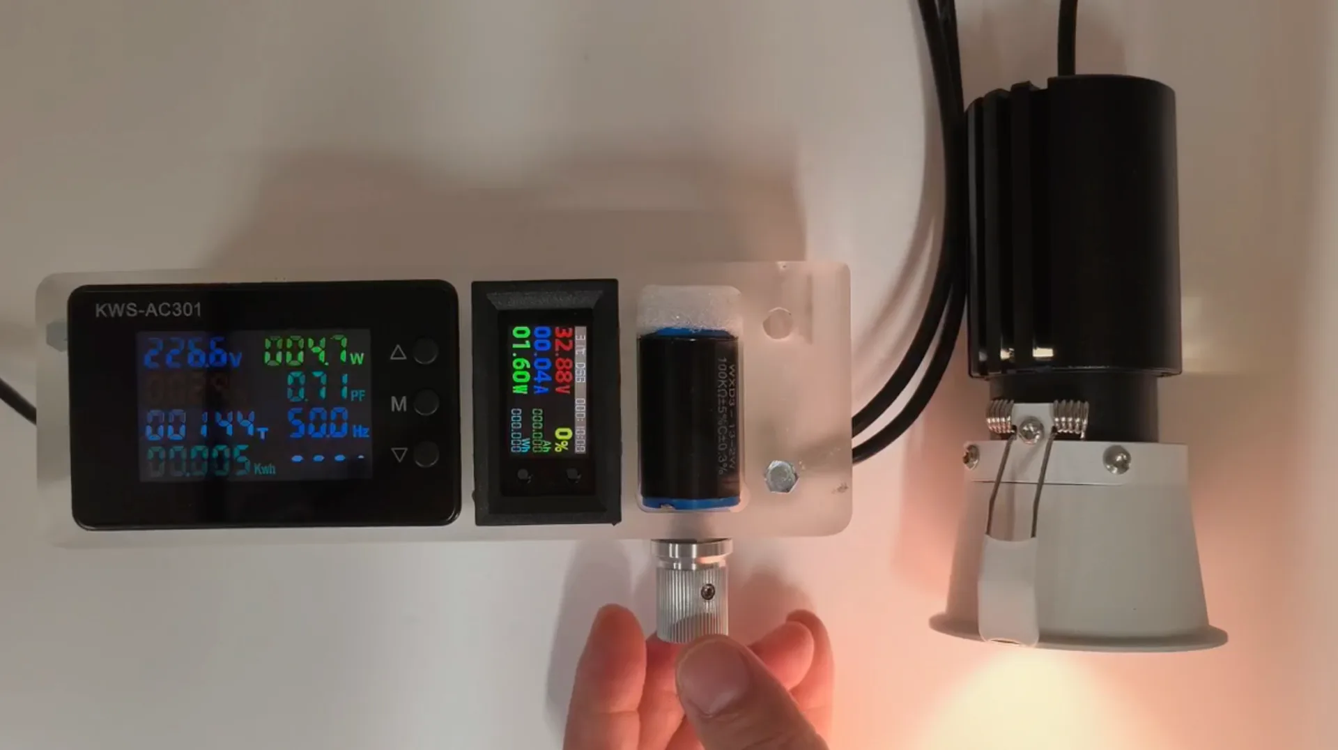 Adjustable LED driver connected to a recessed spotlight for sample testing